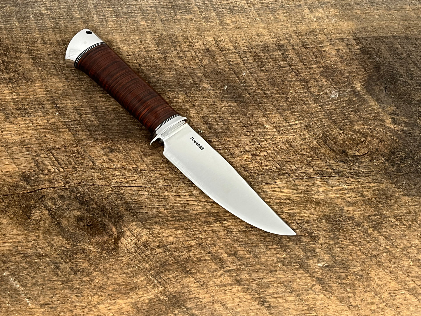 4 3/4” Stacked leather handle Bear hunter